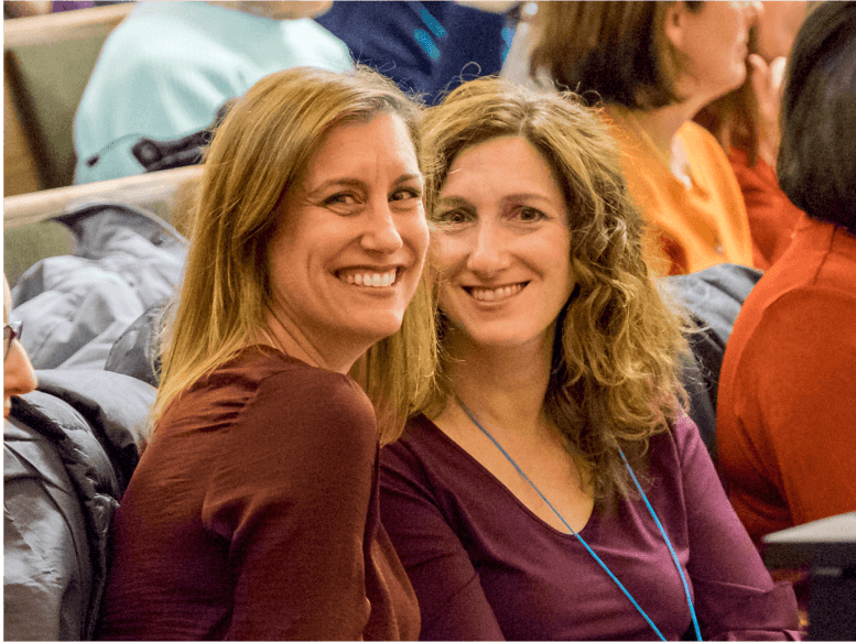 women sitting together in sanctuary pews